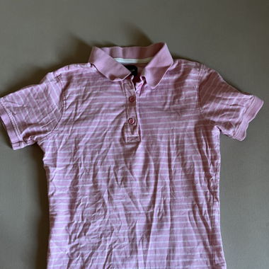 pink polo shirt