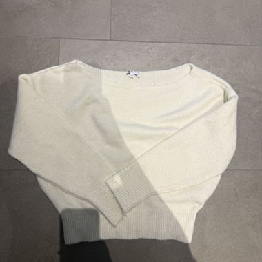 Subdued Off Shoulder White Knit Sweater