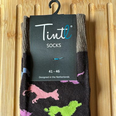Chaussettes noires avec motif coloré de chiens