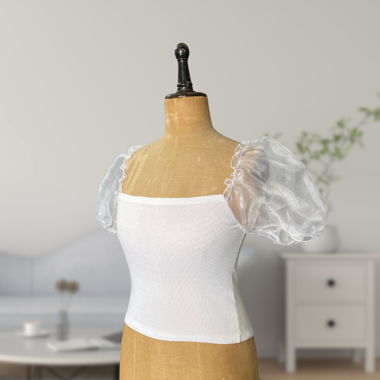 Haut blanc manches bouffantes