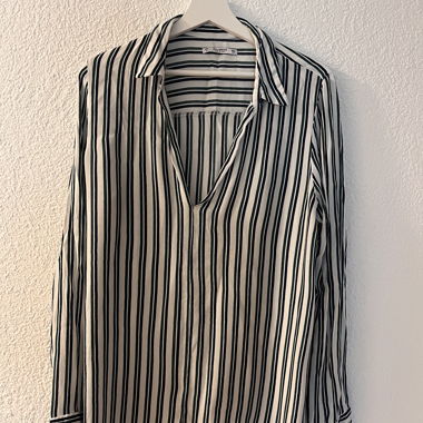 Blusa a righe con colletto