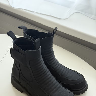 Gepolsterte Stiefel