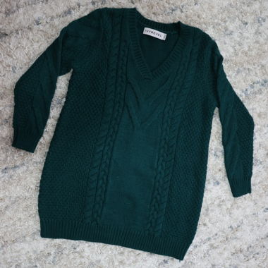 Dark green knit sweater with V-neck