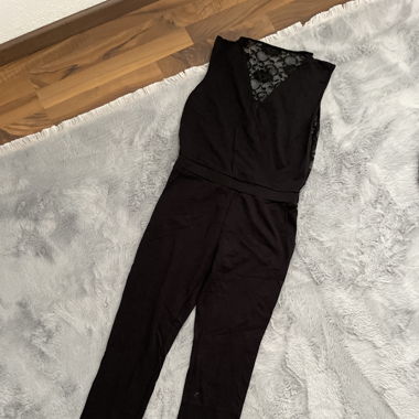 Schwarzer Overall