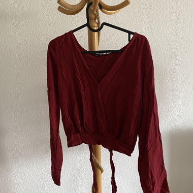 Top a portafoglio rosso di Brandy Melville
