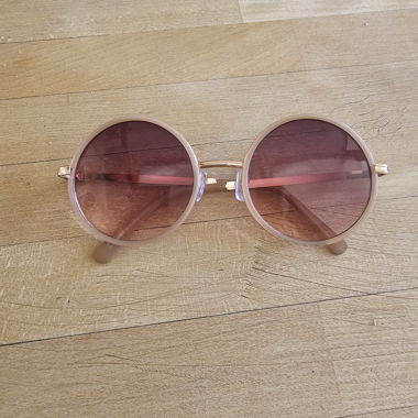 Occhiali da sole rotondi rosé gold