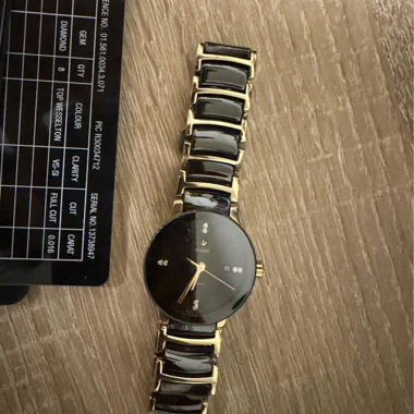 Rado black and gold watch