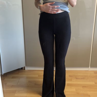 Black flared trousers