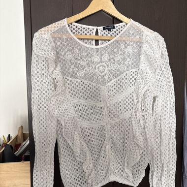 Blusa in pizzo bianco