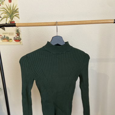 Pull col montant 