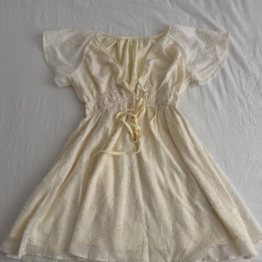 Cream dress with puff sleeves