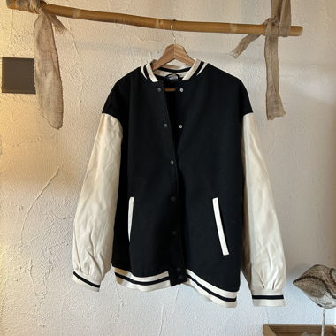 Black and white varsity jacket, size L