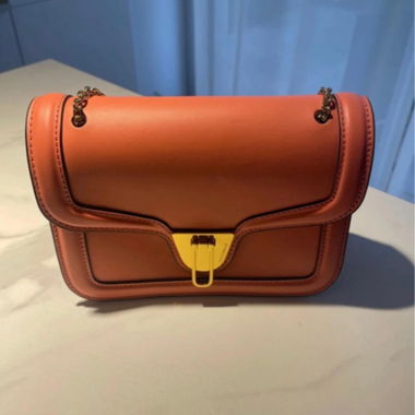 Sac bandouliere Coccinelle rose
