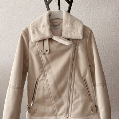 Veste en fausse fourrure beige