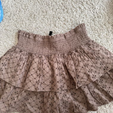 Brown eyelet mini skirt