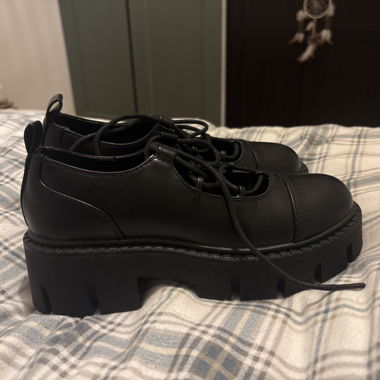 Black platform lace-up shoes