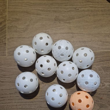 10 balles de unihockey 