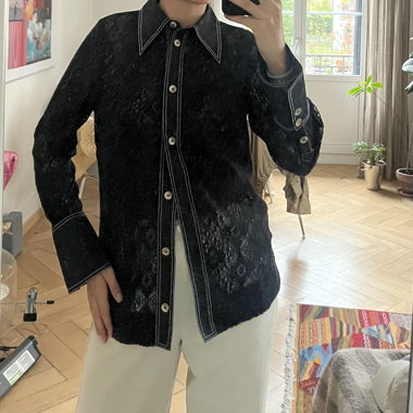 Blusa nera GANNI in pizzo