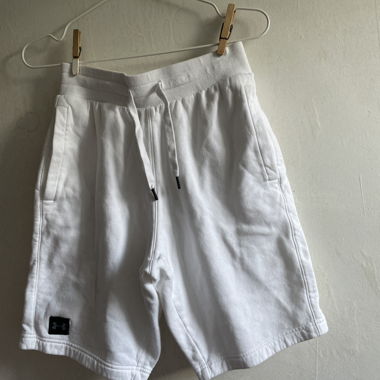 Pantaloncini sportivi bianchi Under Armour