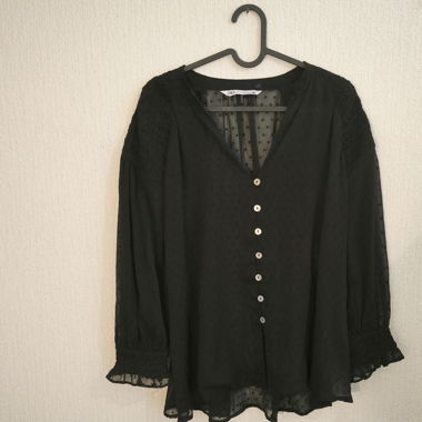 elegant black transparent top