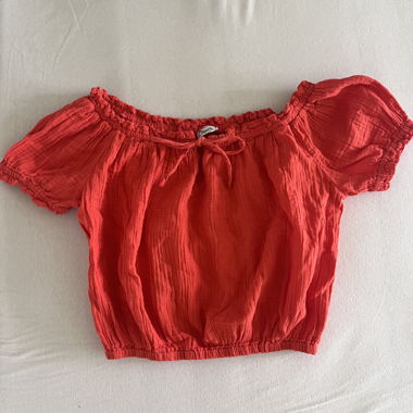 orange off shoulder crop top