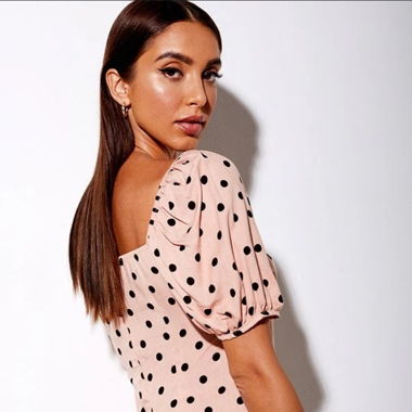 pink dress with black polka dots