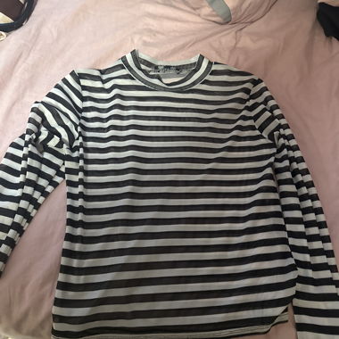 Maglia a maniche lunghe a righe nero e bianco