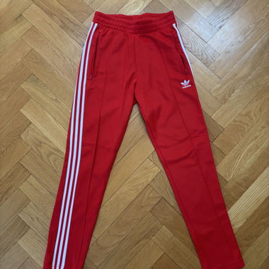Pantaloni Adidas rossi da tuta