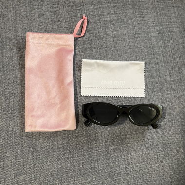 Miu Miu Sonnenbrille Schwarze
