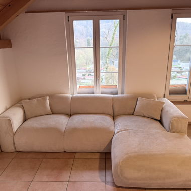 Beiger Ecksofa mit Cordbezug