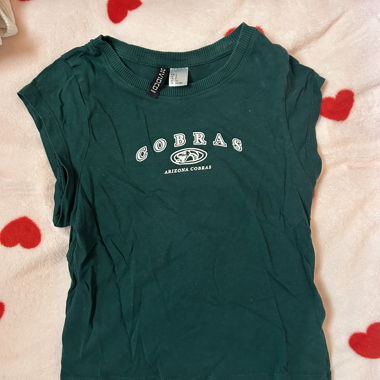 Green cropped COBRAS sleeveless top