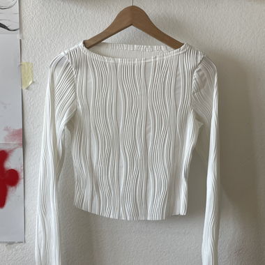 Top bianco a maniche lunghe testurizzato