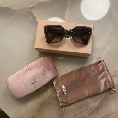 Lunettes de soleil Miu Miu