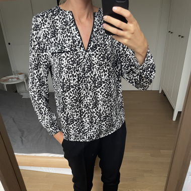 Black and white panther pattern blouse