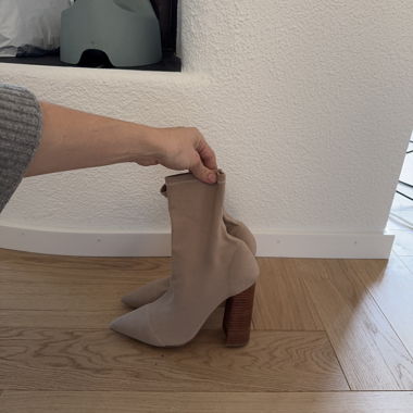Beige sock boots with block heel by Tony Bianco