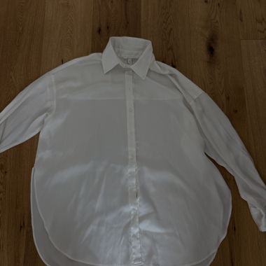 Blouse blanche longue avec col