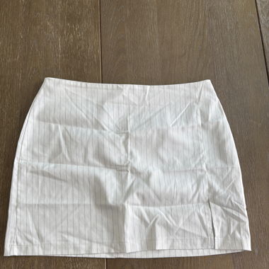 White skirt with grey stripes