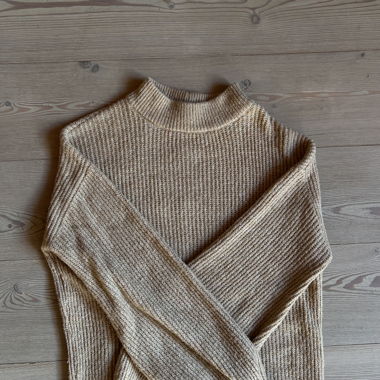 Beige knit sweater with stand-up collar
