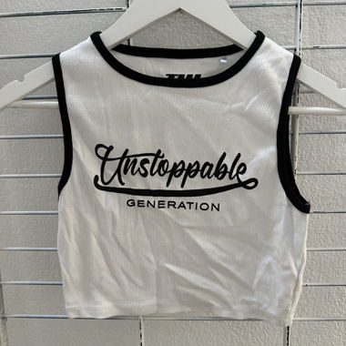 White top with black print. Size M