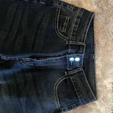 Pantaloni a zampa vita media