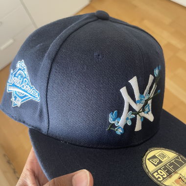 NY cap