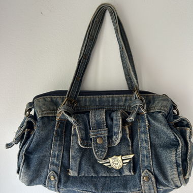 vintage jeanstasche, mit dieselaufstecker dran