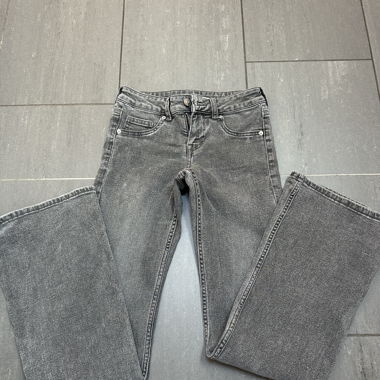 Jeans a zampa grigia - vita bassa