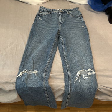 Jeans larghi strappati
