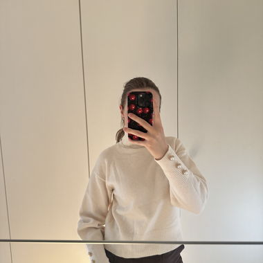 Pull à col roulé beige