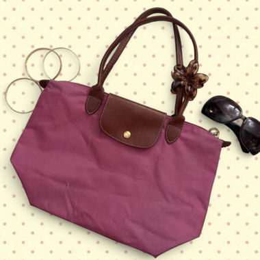 sac Longchamp rose chic avec cuir marron