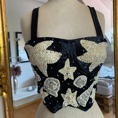 Top corsetto con perline