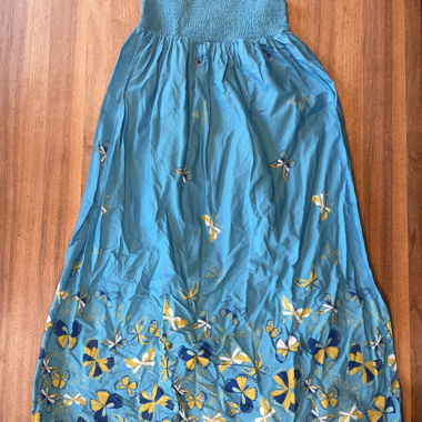 Blue kids' dress with butterflies