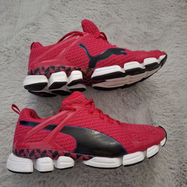 Chaussures de course Puma roses