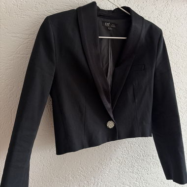 Black short blazer with pearl button